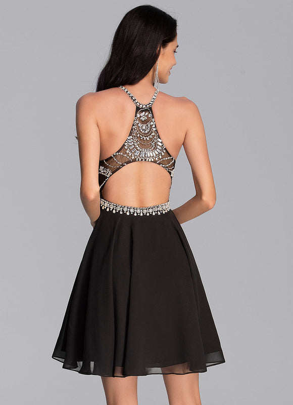Robe Courte Noire Scintillante - gallery 3